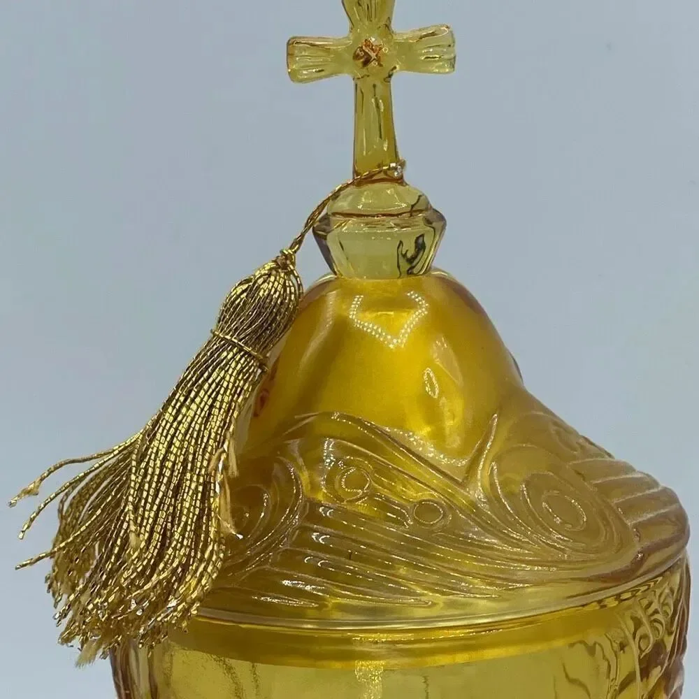Vintage Amber Glass Religious pedestal goblet with music box lid.